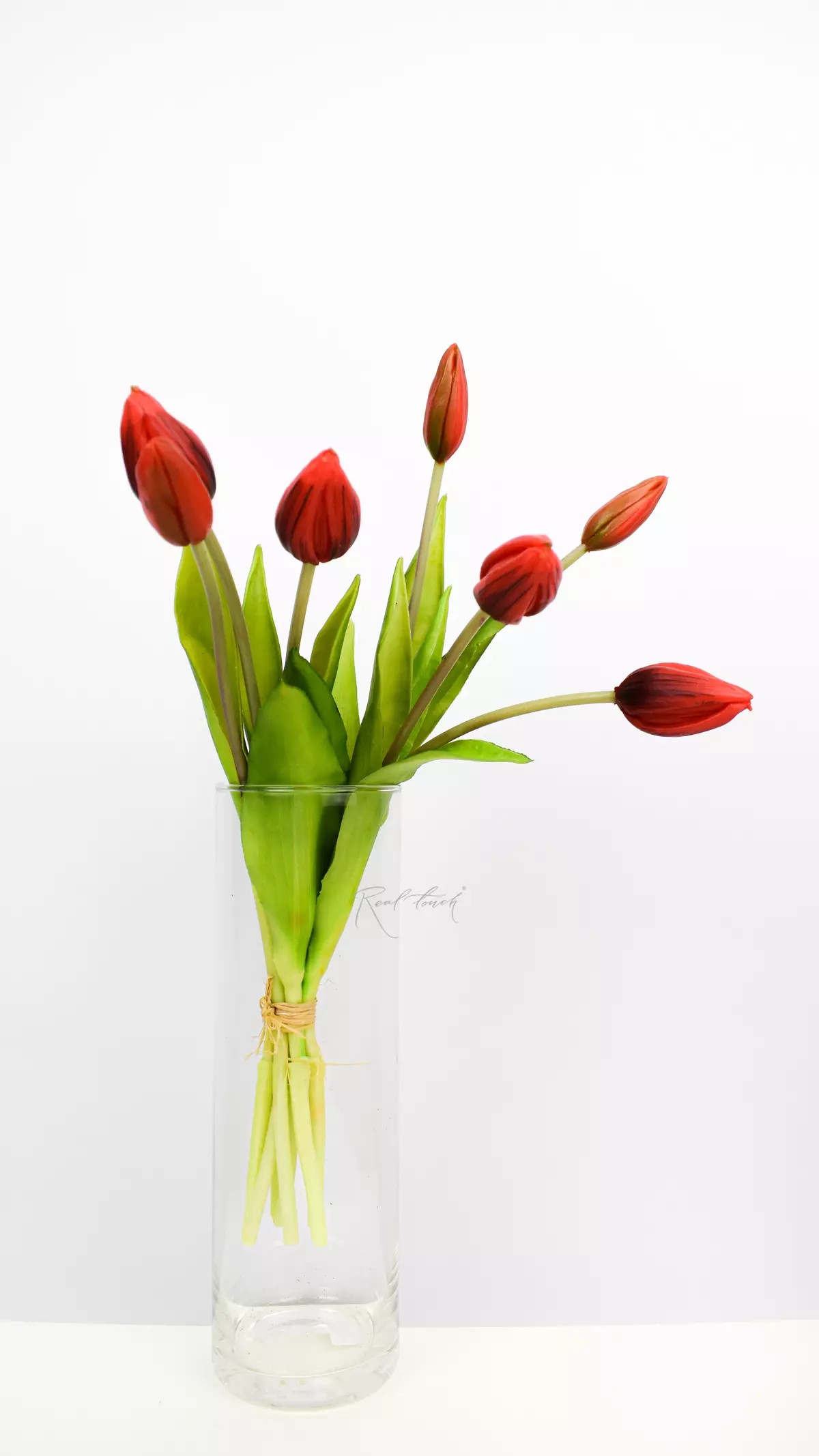 Bouquet of closed tulips 4 + 3 - red